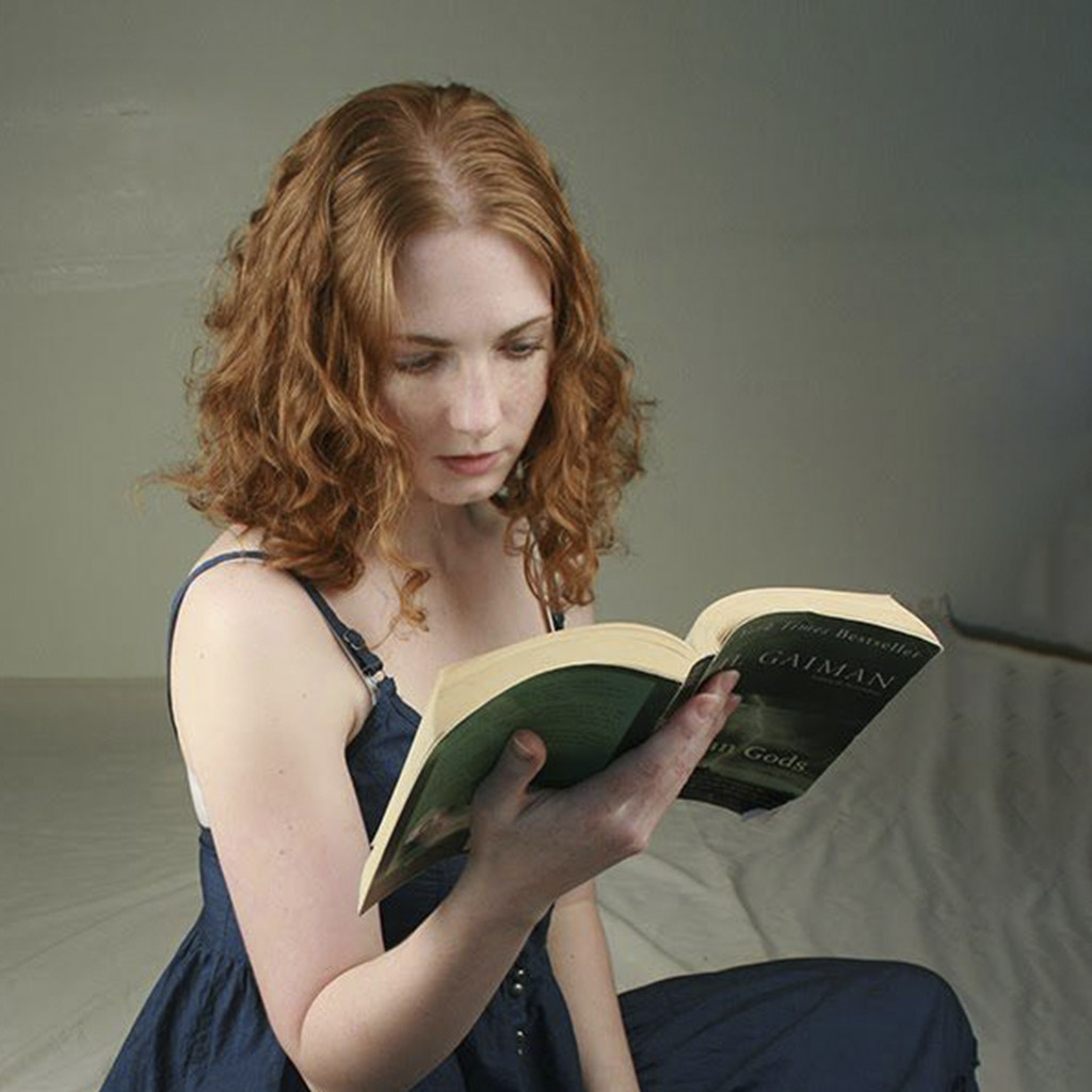 A Beautiful Girl Reading A Book Before Image Retouching Services