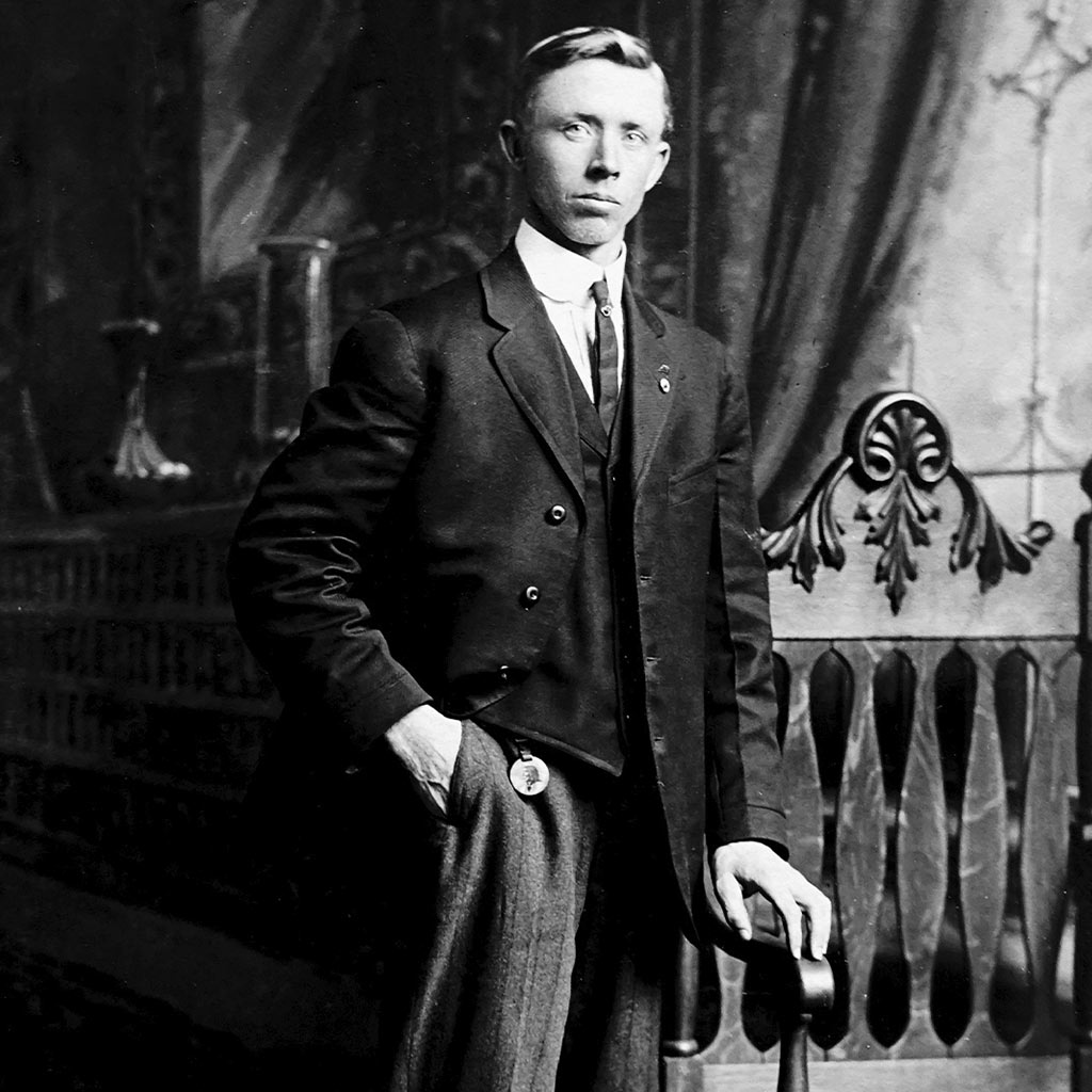 After Photo Restoration Service: A Man Standing in a Black and White Image