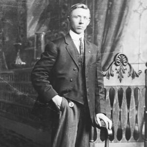 Before Photo Restoration Service: A Man Standing in a Black and White Image