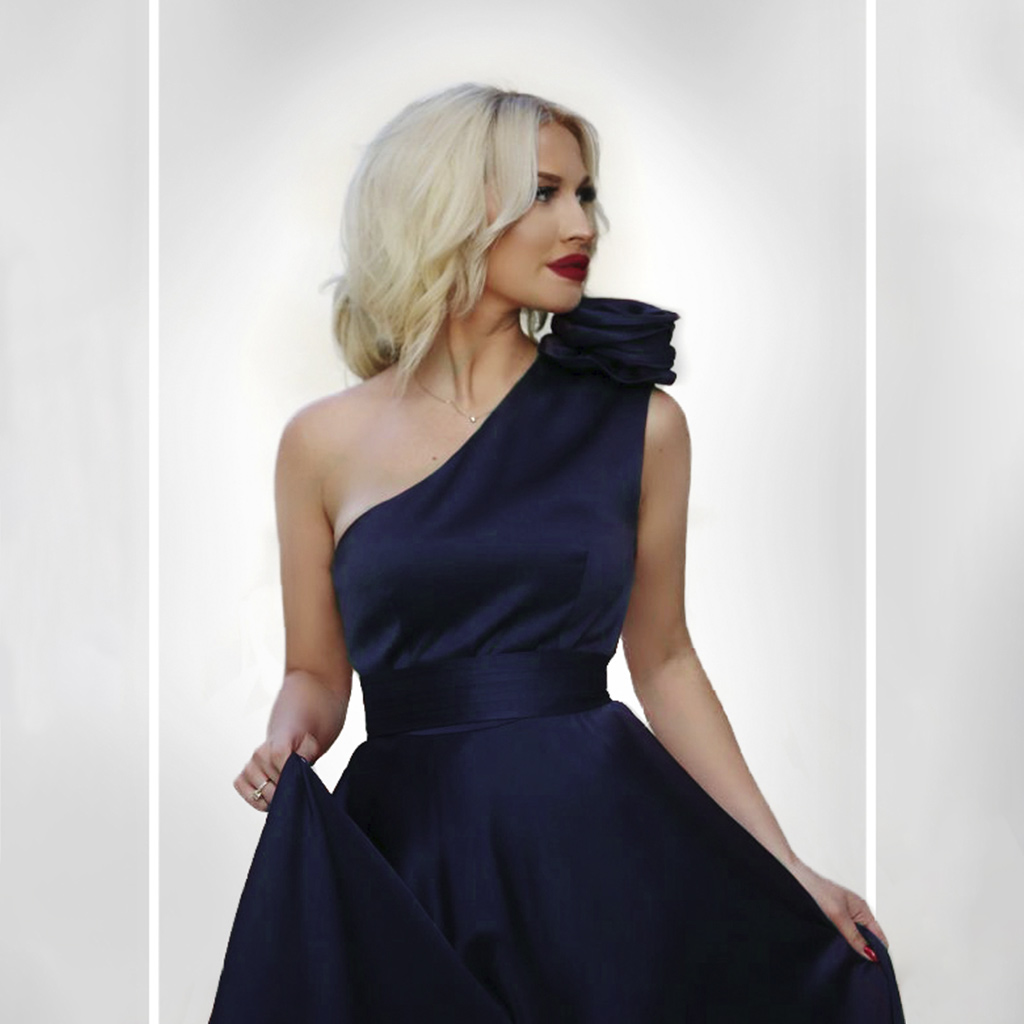A Stunning Woman With A Gorgeous Dress After Color Correction Services