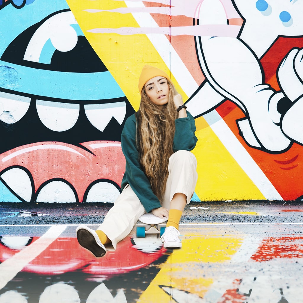 A Girl And Her Skateboard After Image Background Change with Photo Manipulation