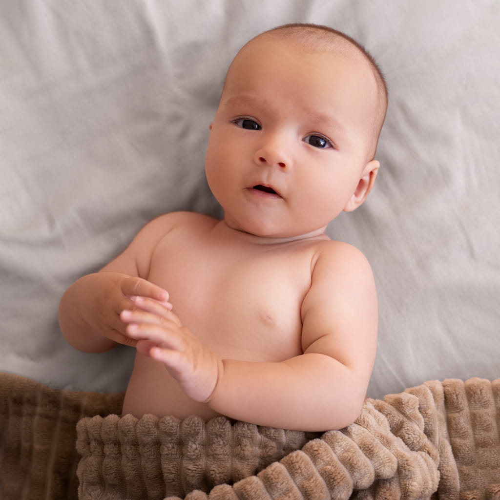 A Child After Newborn Photo Retouching Services