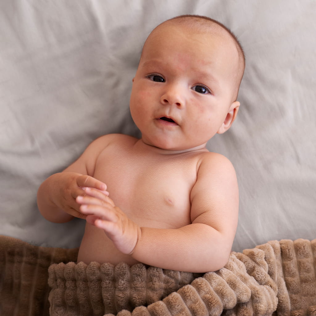 A Child Before Newborn Photo Retouching Services